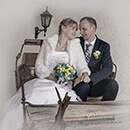 Brautpaarshooting in einer alten Kutsche